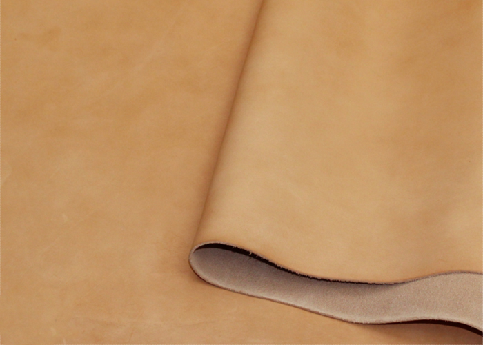 Vegetable tanned leather with natural patina and smooth surface